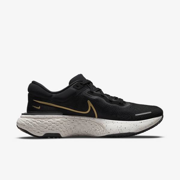 Nike ZoomX Invincible Run Flyknit Straßen Laufschuhe Herren Schwarz Metal Gold | NK523LWO