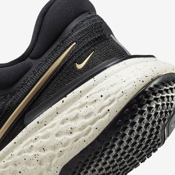 Nike ZoomX Invincible Run Flyknit Straßen Laufschuhe Damen Schwarz Metal Gold | NK751DNQ